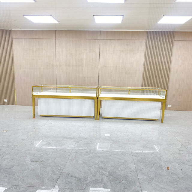 خزانة عرض المجوهرات الذهبية الشمبانيا